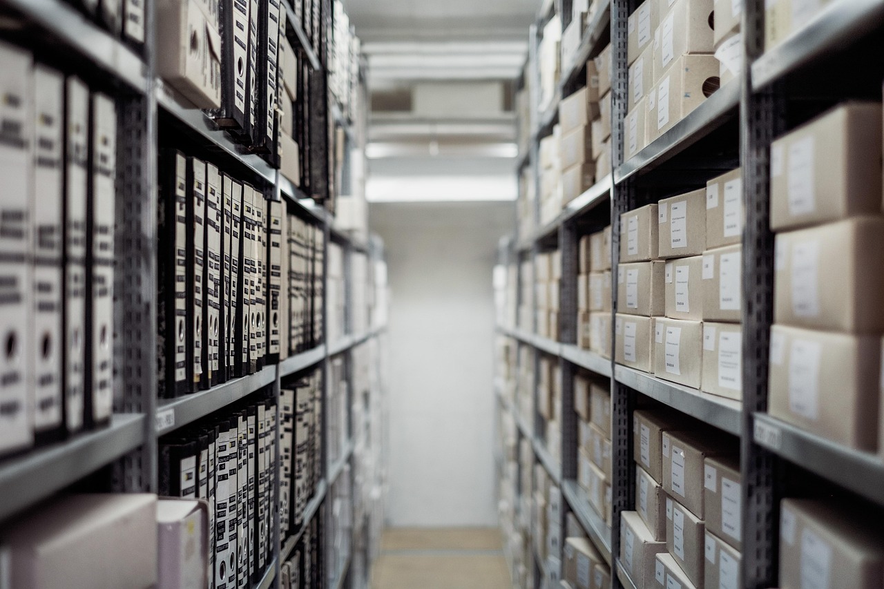 Archive, boxes, shelf — An Inside Look: ISO 45001 Documentation & ISO 50001 Certification for a Better Organization