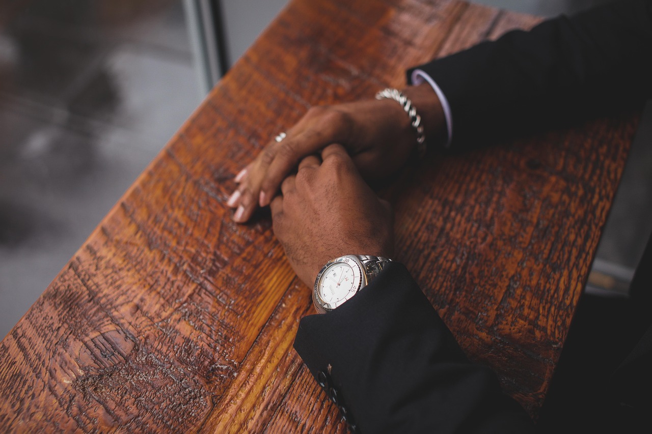 Business, hands, wristwatch — Mastering ISO Standards: An Interactive Guide to ISO 13485 and ISO 45001