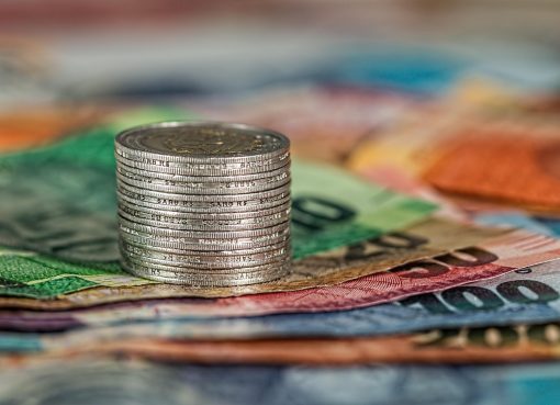 Coins, banknotes, money — Rejuvenate Your Body and Mind with a Professional Swedish Massage