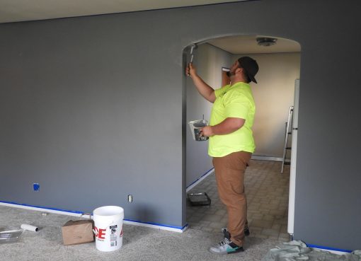 Painter, paint, house — "The Benefits of Choosing Professional Window Installation in Birmingham"